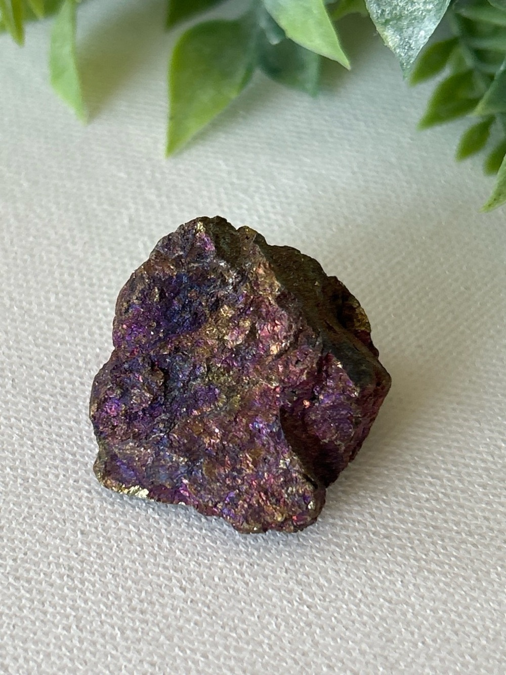 Raw peacock ore (chalcopyrite) tumble